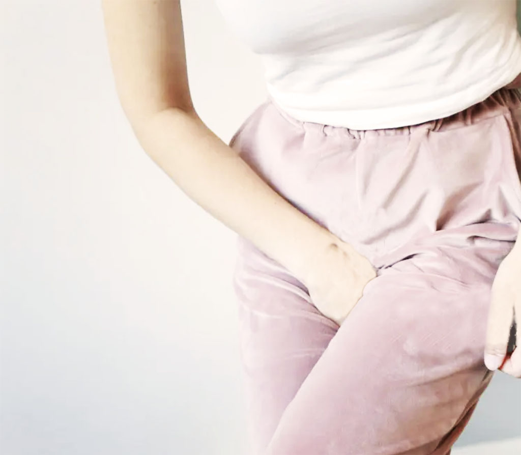 Women standing with strong urge to void